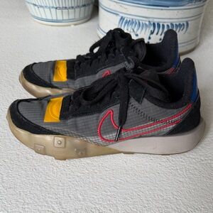 Nike Women’s Black, Yellow, and Red Waffle Sneakers 7.5